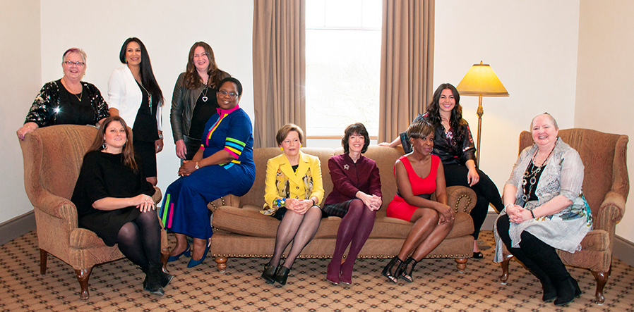 All 2019 Women of Distinction sit together on a couch